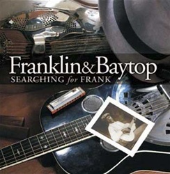 Michael Baytop and Rick Franklin play acoustic blues guitar, harmonica - and bones.